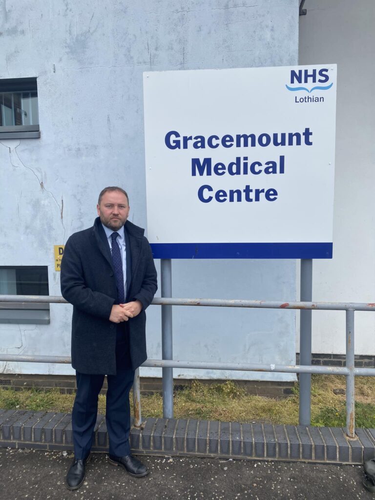 Ian in front of Gracemount Medical Centre
