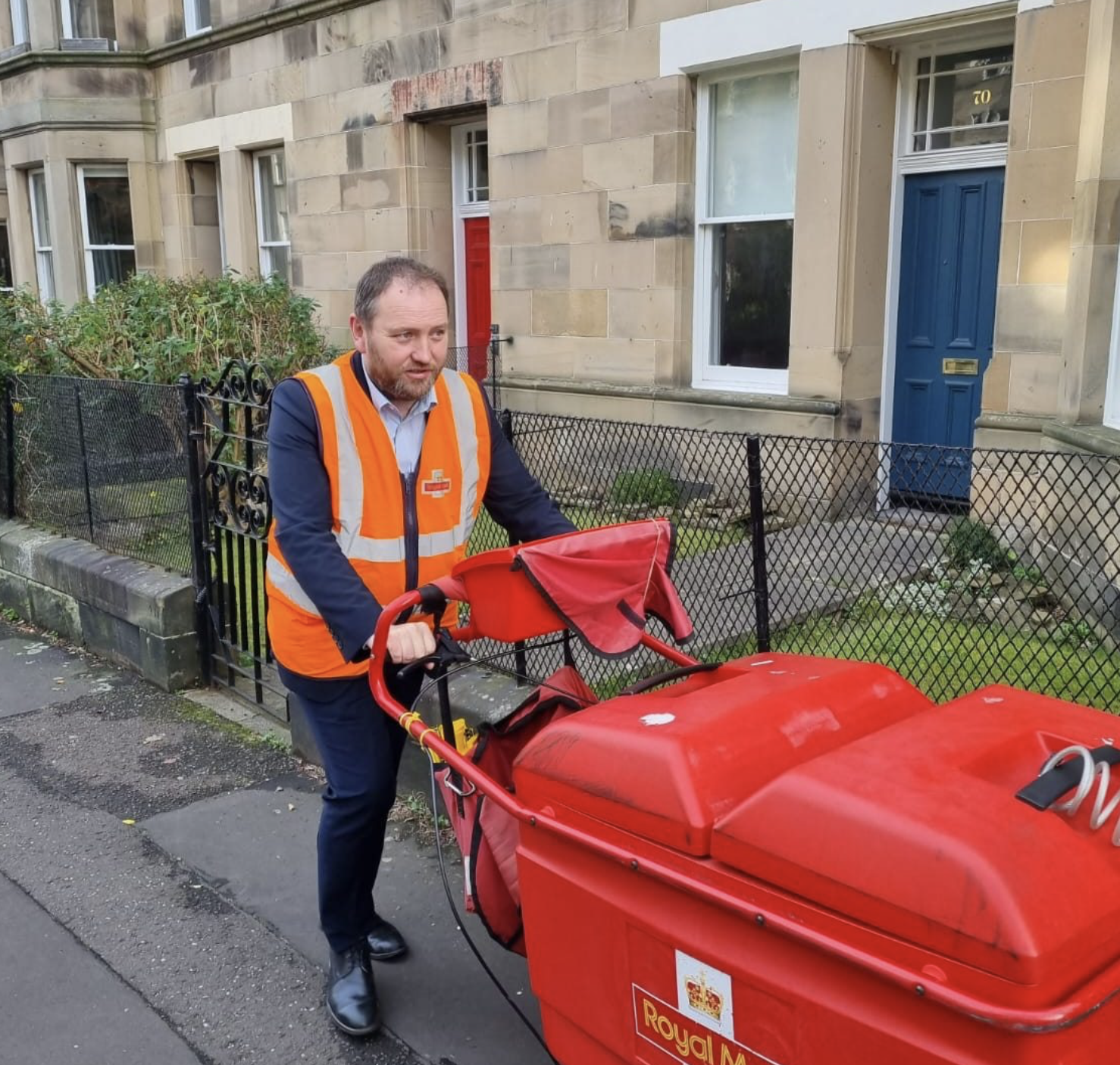 Ian joining a local postie on a delivery round in Marchmont